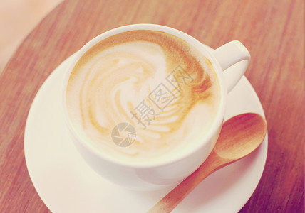 穗花形状泡沫的咖啡图片