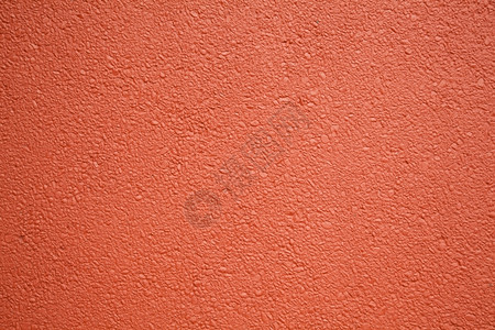 石砾墙的抽象红色背景图案图片