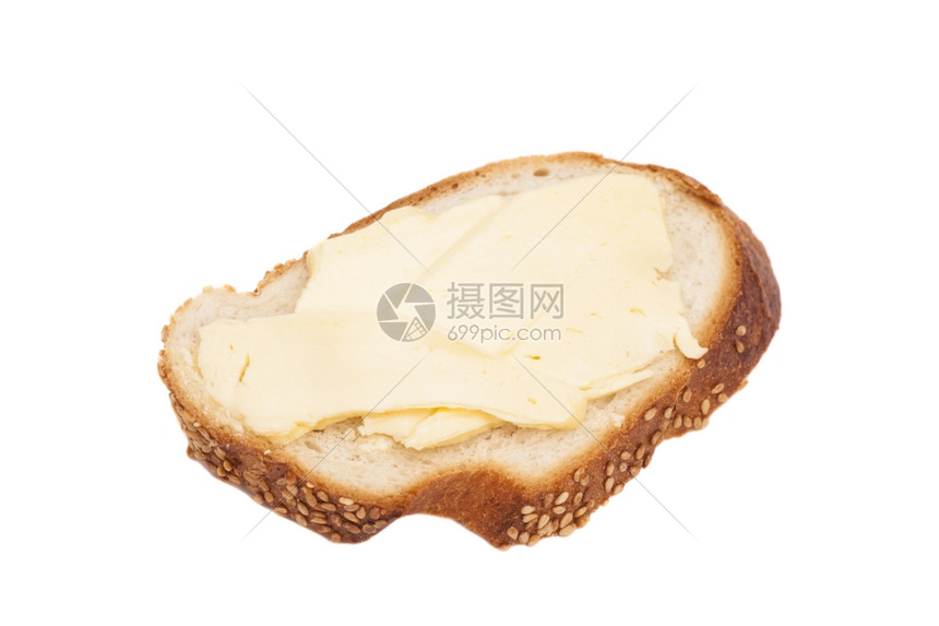 白纸上分离黄油的切片面包图片