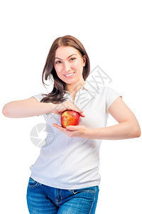 快乐的少女和她手中苹果图片