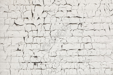 旧的和陈白色洗砖墙裂缝的抽象模式图片