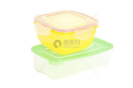 白色隔离的食品塑料容器堆图片