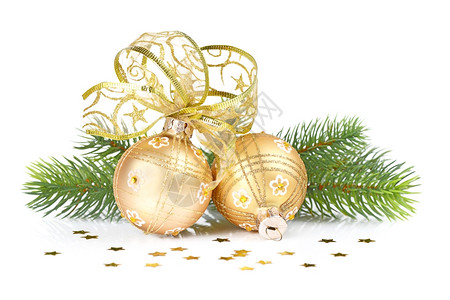 金色的圣诞球美丽的弓树枝和白底彩蛋星图片