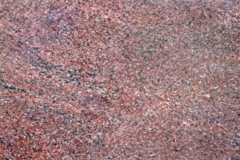 处理过的天然棕色花岗岩的质地图片