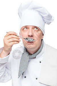 白色背景上金属勺子厨师的特写肖像图片