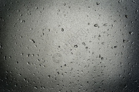 冰霜玻璃上的水滴背景图片