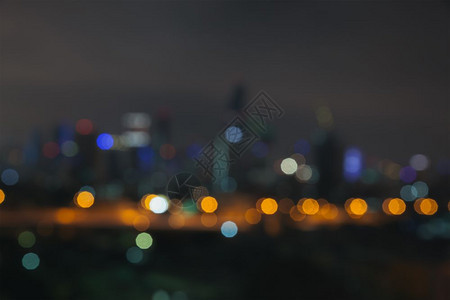 夜光天空背景中抽象的脱焦点bokeh商业城市景色区域背景图片