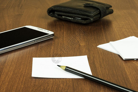 一张纸笔铅智能手机钱包图片