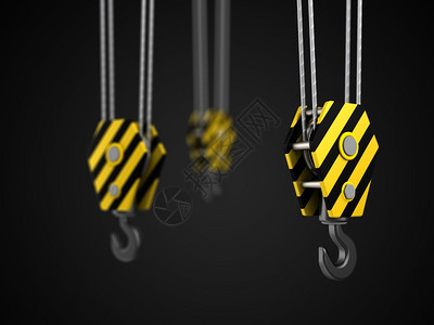 黑色背景上的三个起重机吊钩的三维插图三个起重机吊钩的3d图片