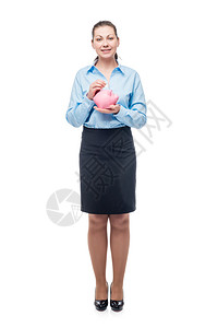 成功的年轻女商人有粉红猪银行白色背景的种高清图片
