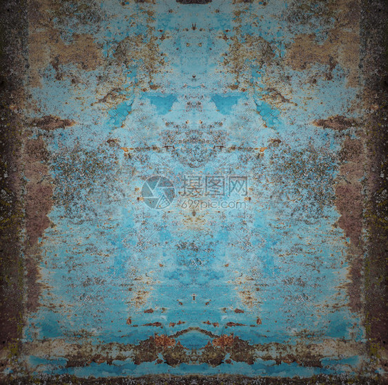古老的董背景生锈金属表面含蓝色涂料粉片和碎裂纹理图片