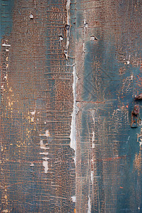 旧锈漆木板背景纹理旧的生锈油漆木板图片