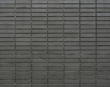 灰色棕砖墙的一部分有strai水泥接缝图片