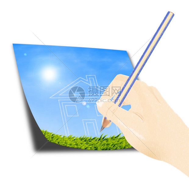 用铅笔画一栋梦境之屋对抗蓝天和绿草图片
