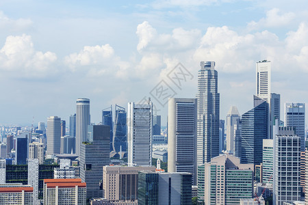 现代金融建筑蓝色天空和云彩商业区城市背景建筑业图片
