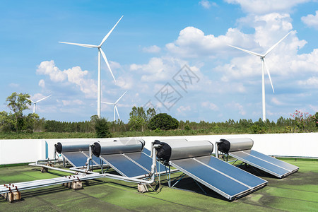太阳能电池板和蓝色天空的风力涡轮机绿色能源图片