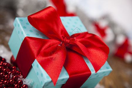 圣诞礼物盒红丝带的礼物盒假日圣诞节背景图片