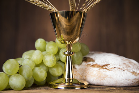面包和葡萄酒圣杯主办者第一圣餐背景背景图片