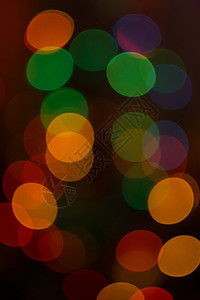 抽象圆形bokeh模糊的彩色光纹理作为背景图片