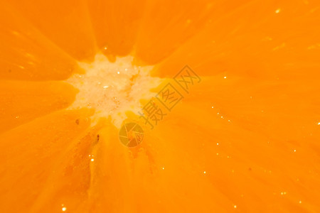 明亮的橙色切片闭合照自然背景图片