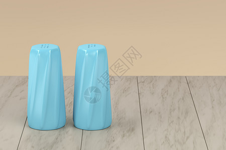 木板上的蓝盐和胡椒搅拌器3d插图图片