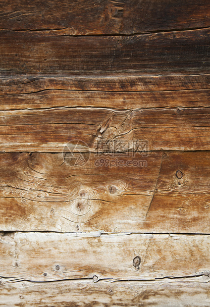 门或谷仓的非常古老的粗糙的棕色风化木板特写图片