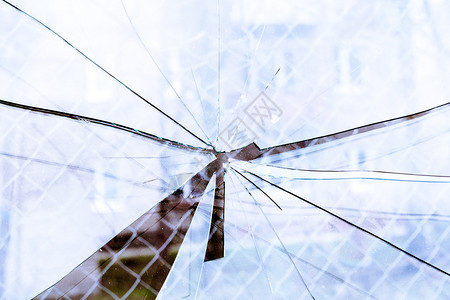 尖的玻璃洞裂缝碎片街边的玻璃倒退颜色图片