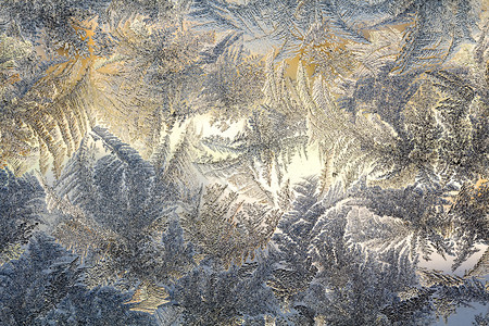 冬季窗口由霜冻制成模式作为背景图片