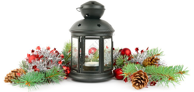 圣诞节装饰的构成明亮装饰品手灯和在白色背景上隔绝的树枝宽幅照片图片