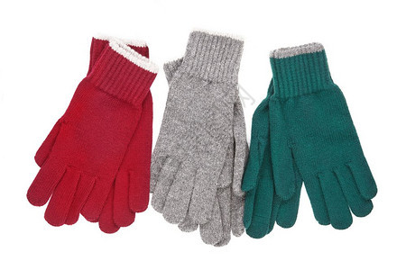 三对有色手套冬装附件白色背景隔离三对编织手套图片