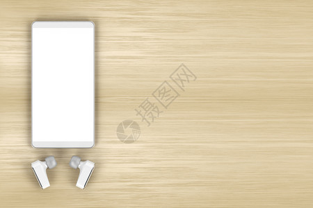 顶视图在木板上显示空白器和无线耳机的智能手图片