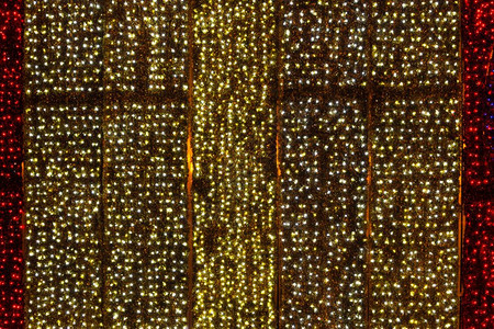 圣诞节灯光背景由圣诞节灯光照亮的墙壁图片