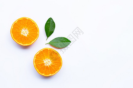 白色背景上有叶子的新鲜柑橘水果复制空间图片