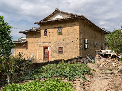 在Xiamen附近的usco遗产地在石屋周围种植茶叶树在Wanuesco世界遗产地外的石屋图片