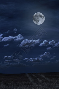 月亮和夜云光路面背景深蓝色图片