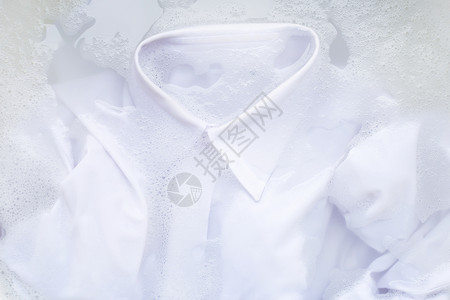 洗衣服适量洗衣服前一抹白衬衫背景