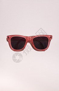 红色明太阳镜粉面背景夏季时间派对和假期概念墨镜的最小图片
