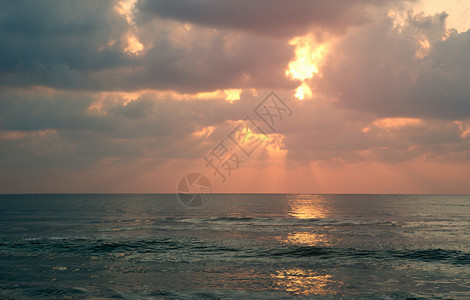 海面日落背景图片