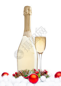 一瓶香槟和杯在白色背景上装饰圣诞节品图片