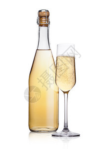 和一瓶黄色香槟白背景的泡和反光图片