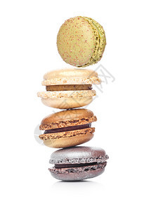 法国奢华多彩的马卡松甜点蛋糕白色背景上面加糖图片
