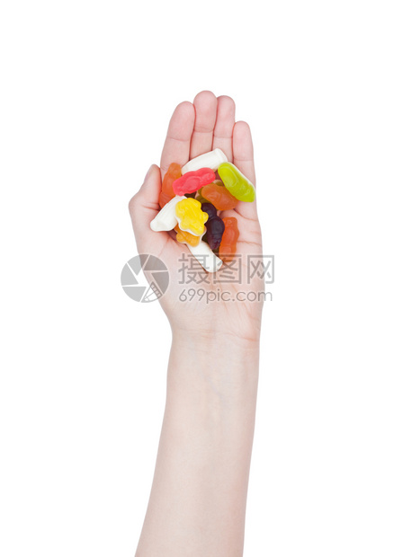 女手拿着白色背景的甜美彩糖