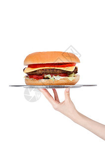 手持套托盘新鲜牛肉汉堡蔬菜和酱白色背景图片