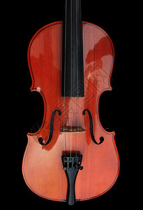 用木制的小提琴用黑色背景的木制小提琴图片