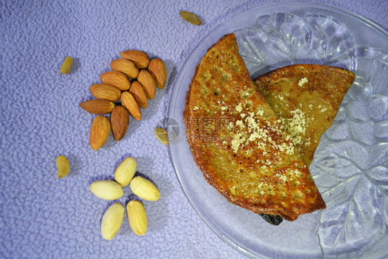 麦芽饼是一种煎作为甜点或通常在霍利节上制作的零食图片