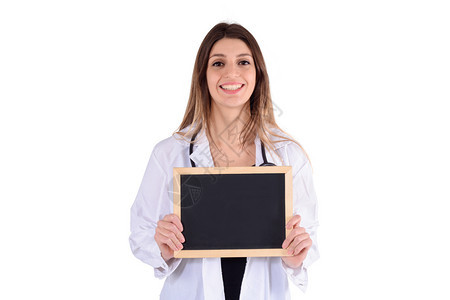 年轻女医生的听诊器肖像和工作室的黑板医疗和保健概念图片