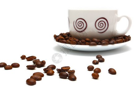 咖啡豆和白杯图片