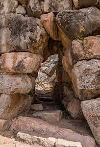 霍斯潘农巨大的巨石构成了希腊泰林城堡和宫殿的墙壁希腊伯罗奔尼撒泰林斯古希腊历史遗址背景