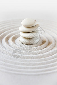 沙子上的白石堆日本花园背景情况图片