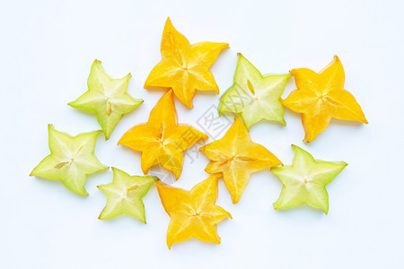 白底绿色和黄切片成熟的恒星水果图片